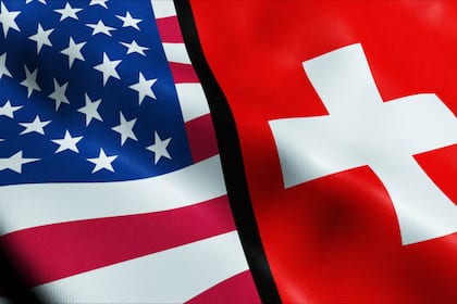 US-Unternehmen übernimmt Schweizer Vermögensverwalter Baseline Wealth Management Die Flaggen der USA und der Schweiz.