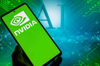 Hedgefonds sind bis über beide Ohren in Nvidia und Co investiert Nvidia-Logo auf einem Smartphone mit AI im Hintergrund.