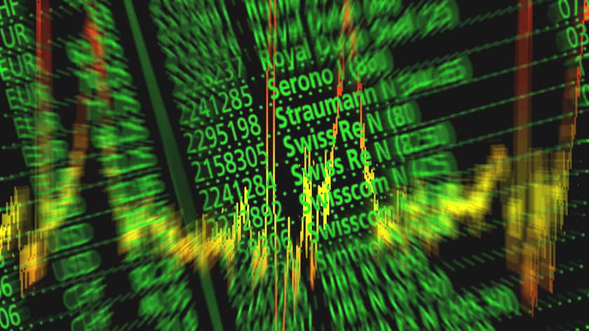 Börsenkurse auf einer Anzeigetafel.