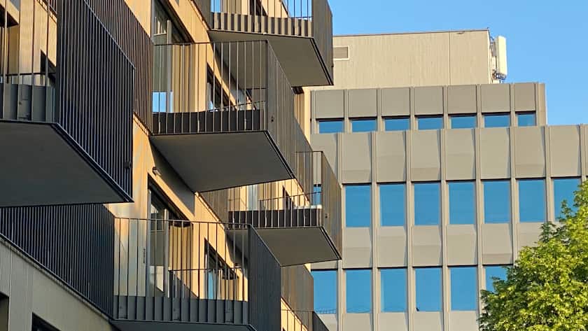 Wohn- und Gewerbeimmobilie nebeneinander in Zürich.