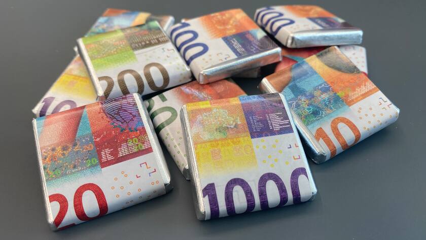 Giveaways der Schweizerischen Nationalbank: Mini-Schokolade verpackt als Schweizer Banknoten.
