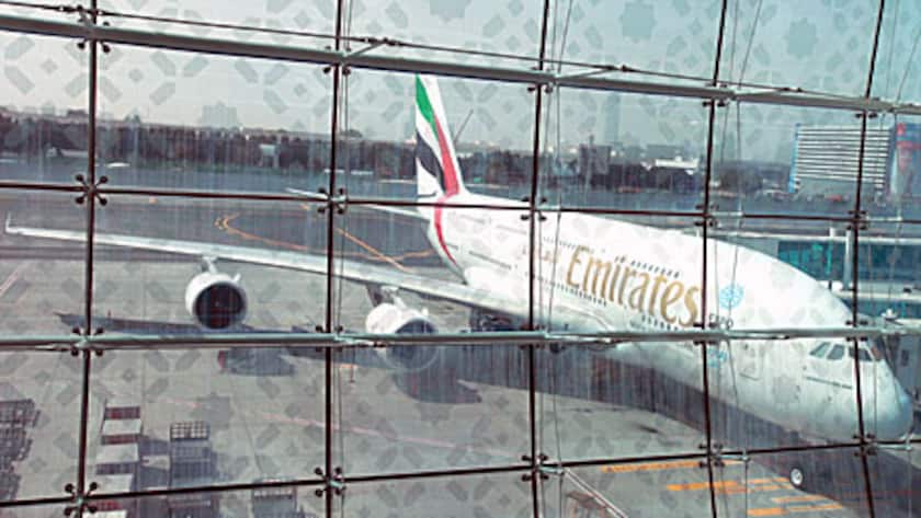 An Emirates Airline Airbus A380-800 aircraft is seen on the tarmac outside terminal 3 at concourse A, the new A380 terminal at Dubai International Airport in Dubai, United Arab Emirates, on Monday, Feb. 25, 2013.