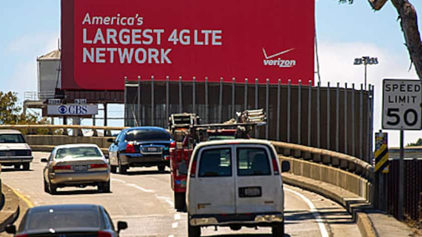 Cars drive past a Verizon Wireless billboard in San Francisco, California, U.S. on Thursday Aug. 29, 2013.