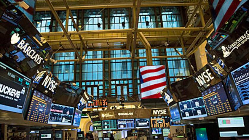 Booths stand on the floor of the New York Stock Exchange (NYSE) in New York, U.S., on Monday, Feb. 25, 2013.