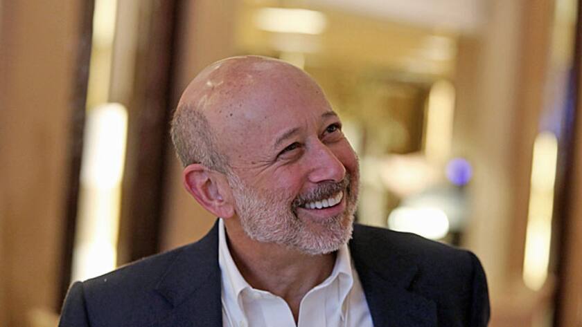 Lloyd Blankfein, chief executive officer of Goldman Sachs Group Inc., reacts during a break in sessions on day three of the World Economic Forum (WEF) in Davos, Switzerland, on Friday, Jan. 23, 2015.