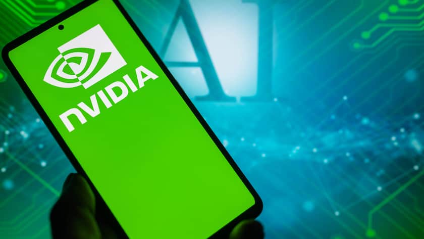 Nvidia-Logo auf einem Smartphone mit AI im Hintergrund.