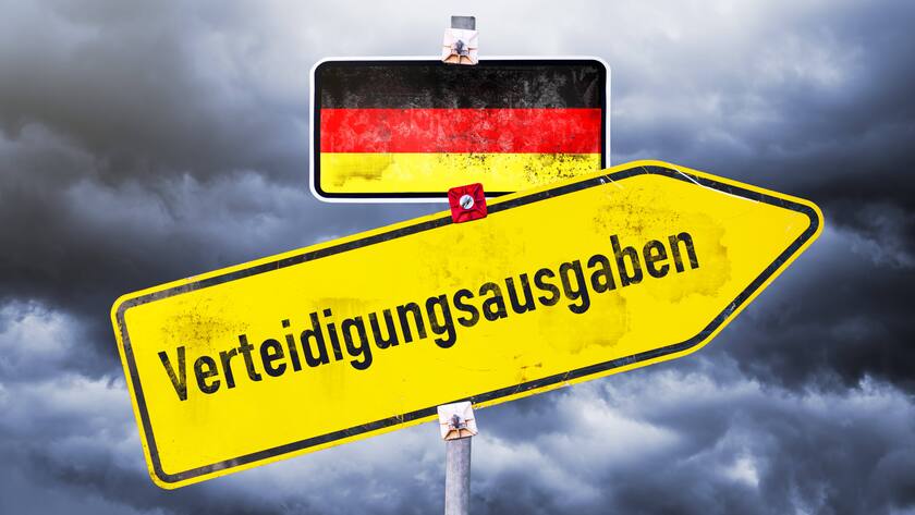 Aufsteigender Wegweiser mit der Aufschrift "Verteidigungsausgaben"