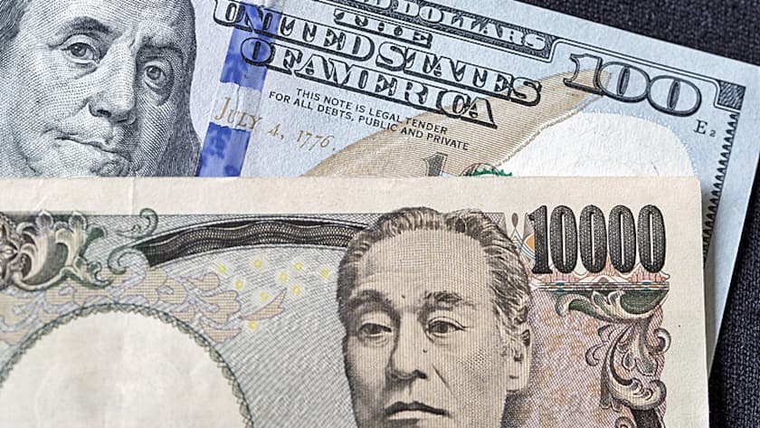 Japanische 10'000-Yen-Note vor US-amerikanischer 100-Dollar-Note (14.4.2019).