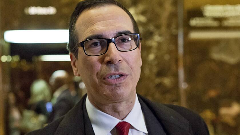Steven Mnuchin, chief executive officer of Dune Capital Management LP, speaks to the media in the lobby of Trump Tower in New York, U.S., on Wednesday, Nov. 30, 2016.