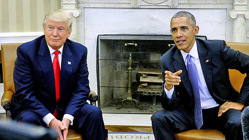 U.S. President Barack Obama, right, speaks as U.S. President-elect Donald Trump listens during a news conference in the Oval Office of the White House in Washington, D.C., U.S., on Thursday, Nov. 10, 2016.